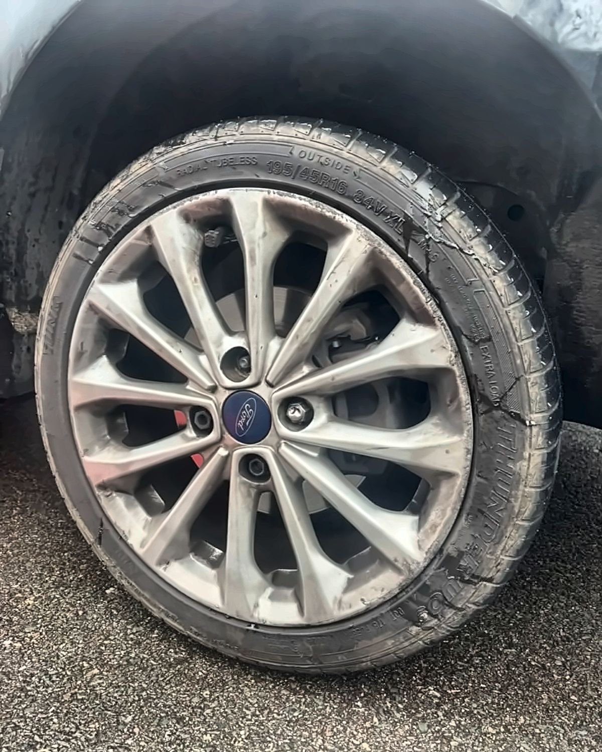 Ford Fiesta ST alloy wheel before - Gloss black - ST centre caps and black bolts - Epsom
