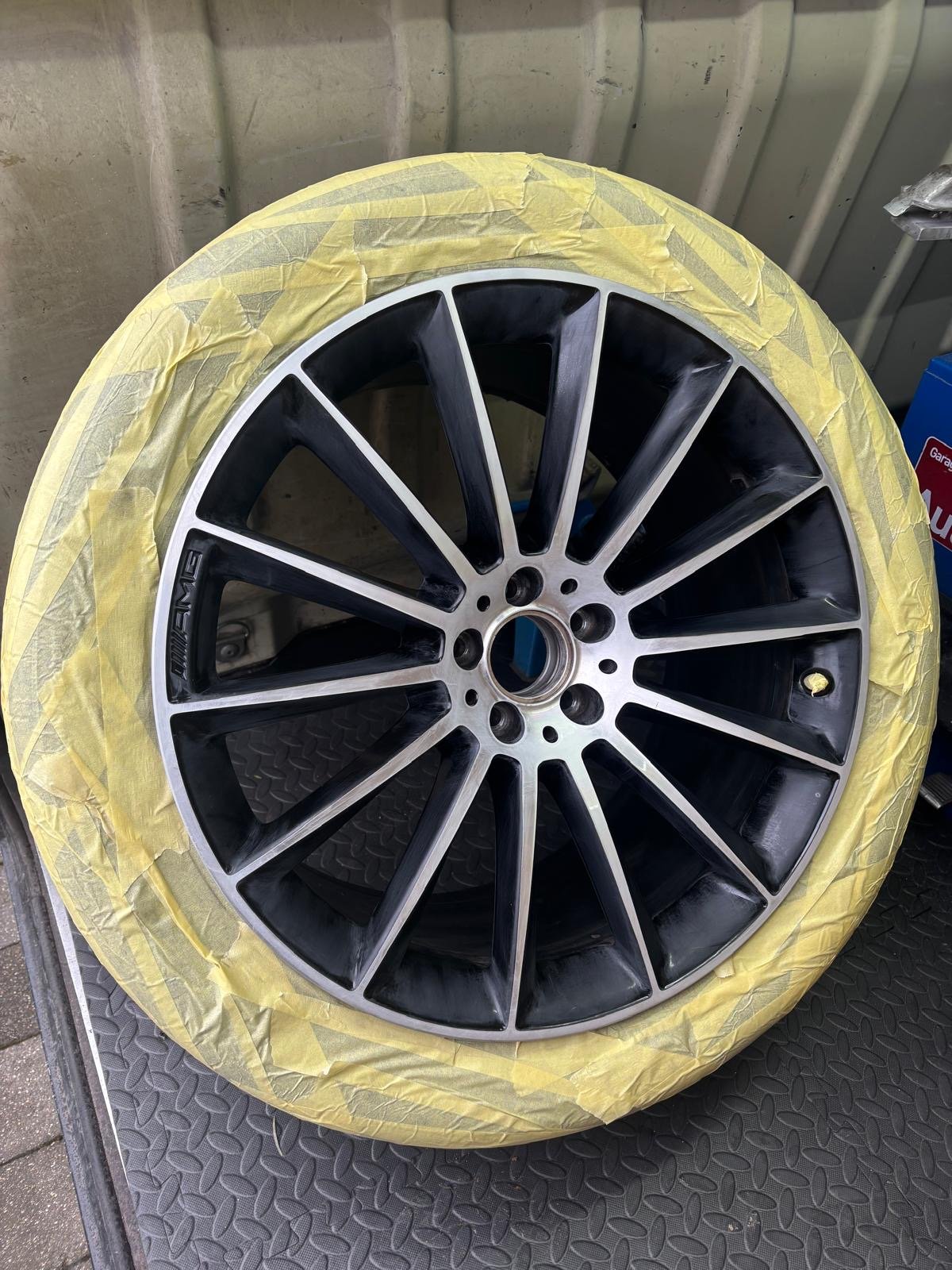 Alloy wheel in its original colour before the colour change