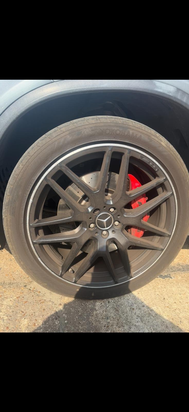 Mercedes AMG alloy wheel masked up and prepared for powder coating