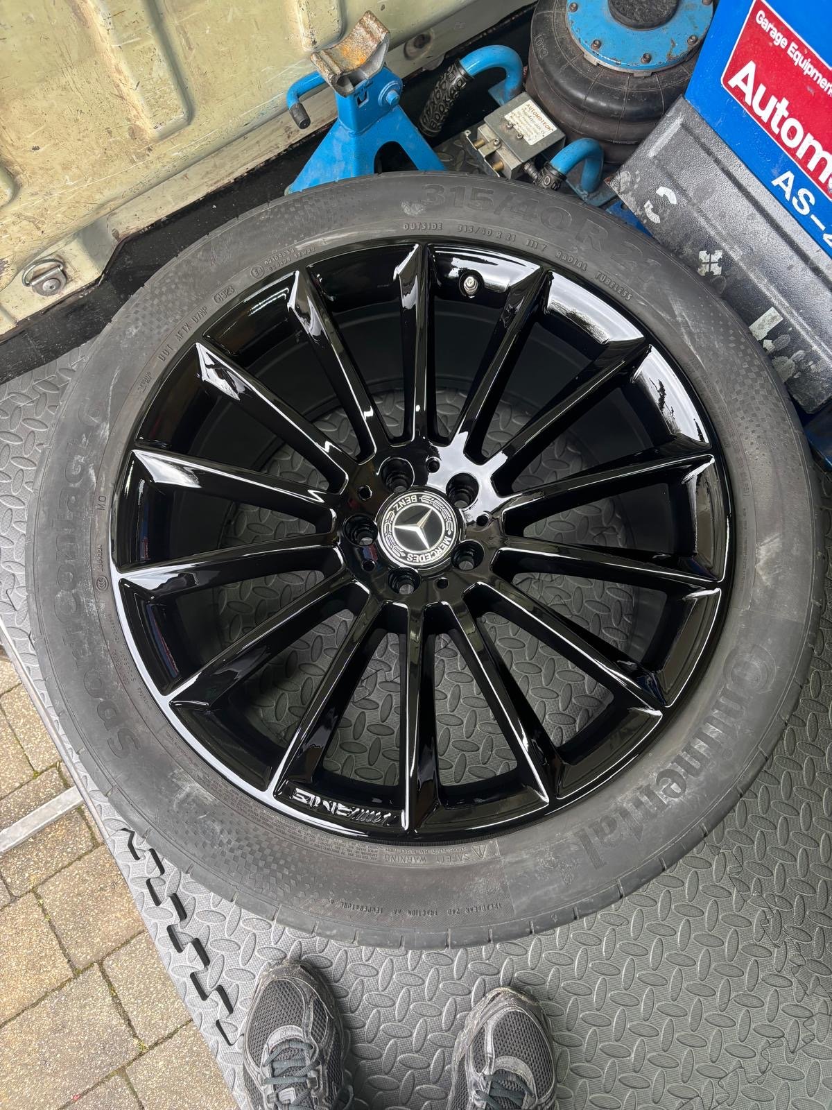 Alloy wheel after a professional colour change to a gloss finish